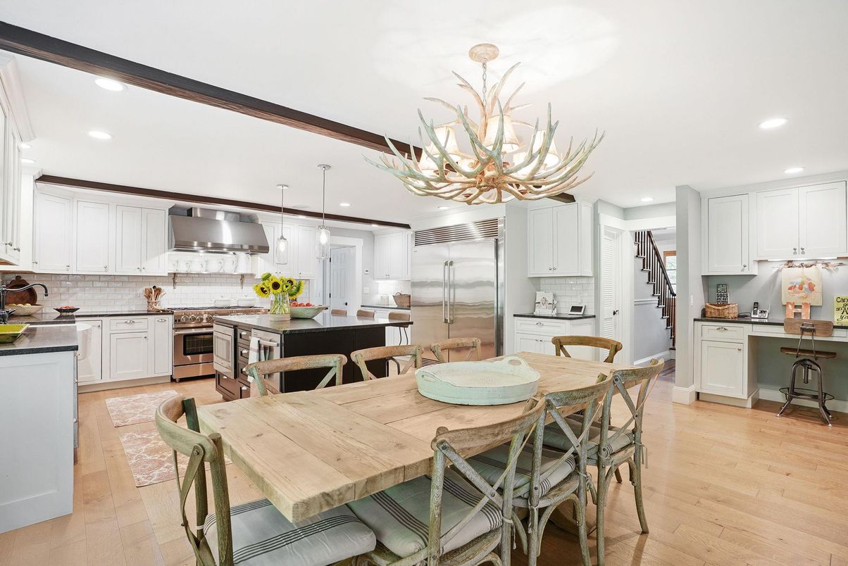 Chandelier, Dining room, Interior, Kitchen, Pendant Lights, Recessed Lighting, Stainless Steel Appliances, Wood Texture Flooring