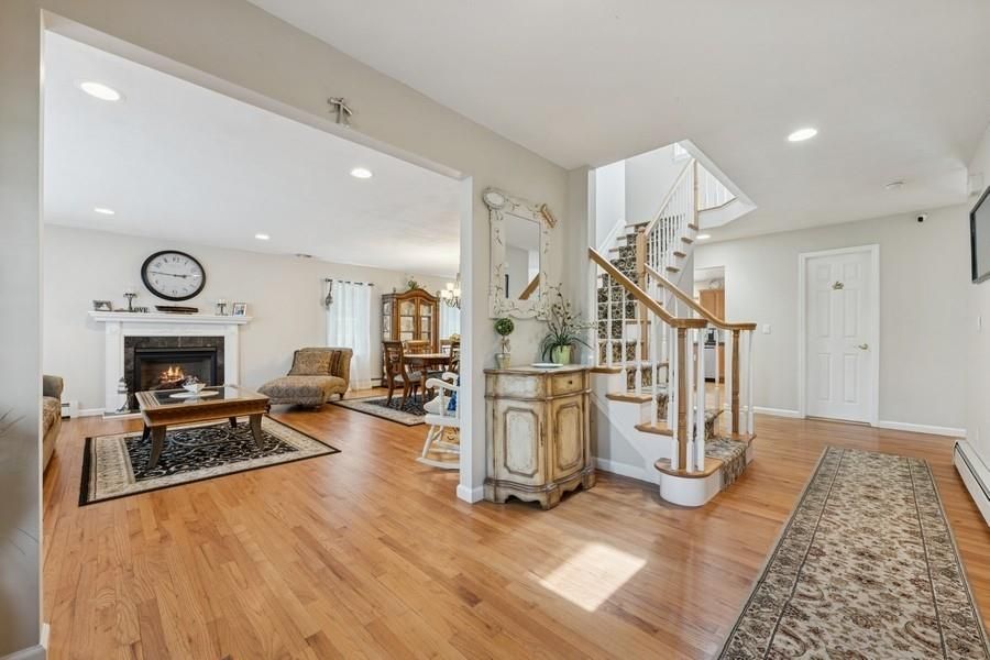 Dining room, Fireplace, Interior, Living room, Recessed Lighting, Wood Texture Flooring
