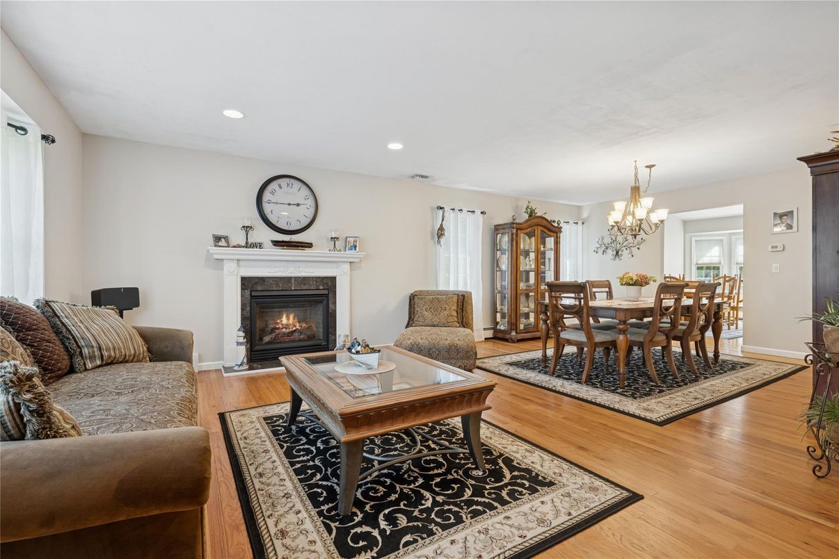 Chandelier, Dining room, Fireplace, Interior, Living room, Recessed Lighting, Wood Texture Flooring
