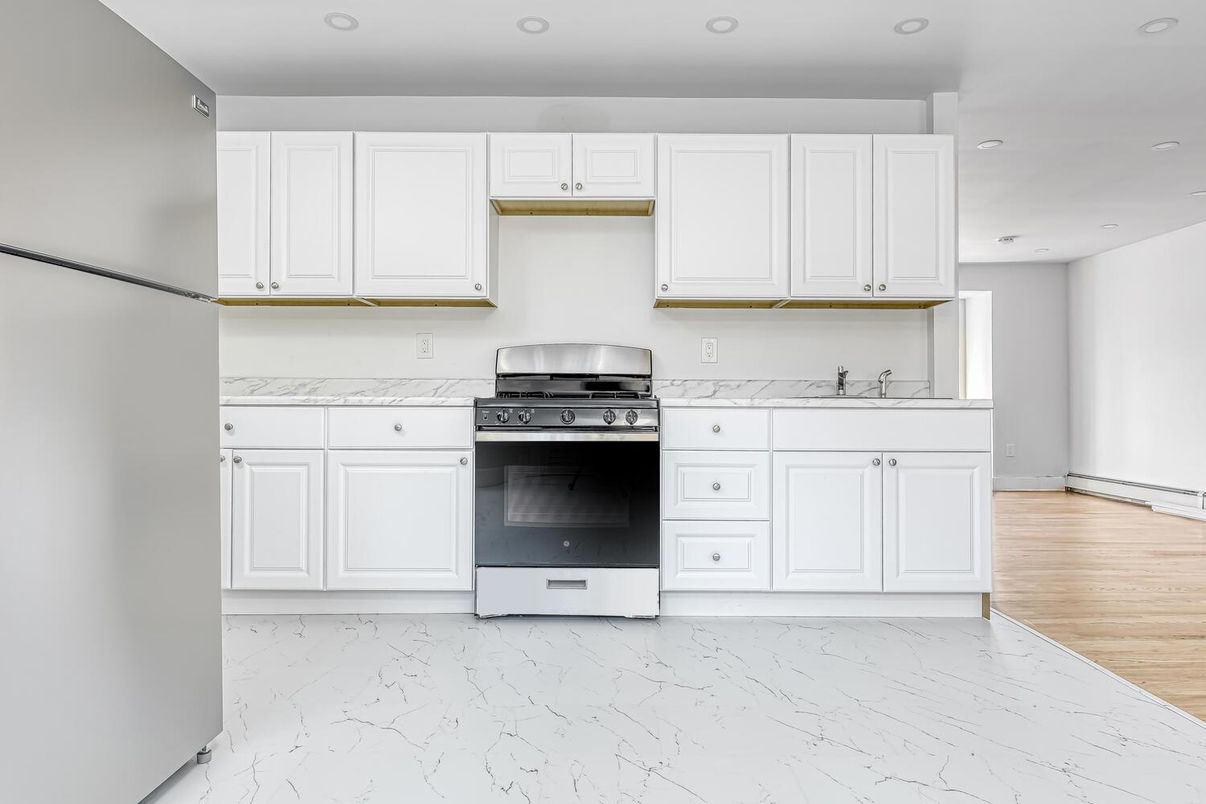 Interior, Kitchen, Marble, Recessed Lighting, Stainless Steel Appliances, Wood Texture Flooring