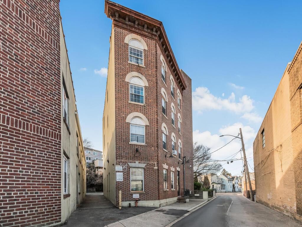 Exterior, Facade, Brick Facade, Condo Building