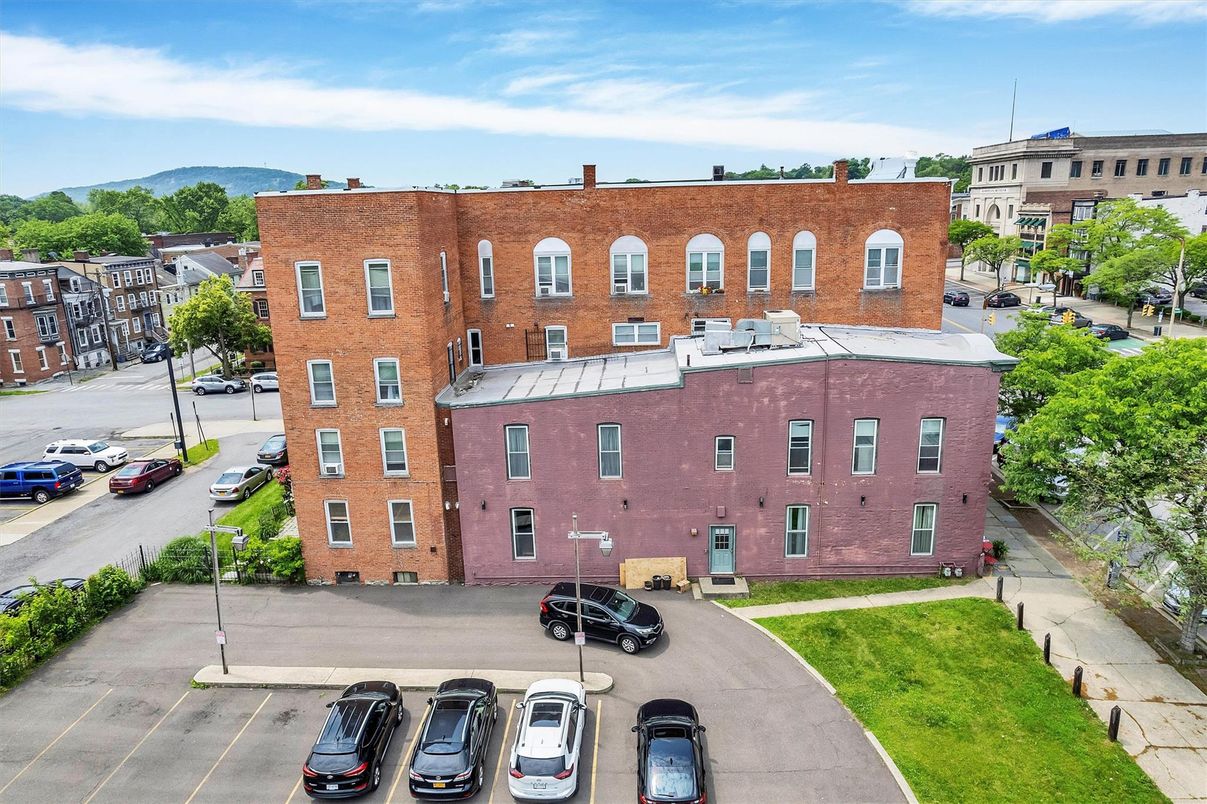 Exterior, Facade, Brick Facade, Condo Building