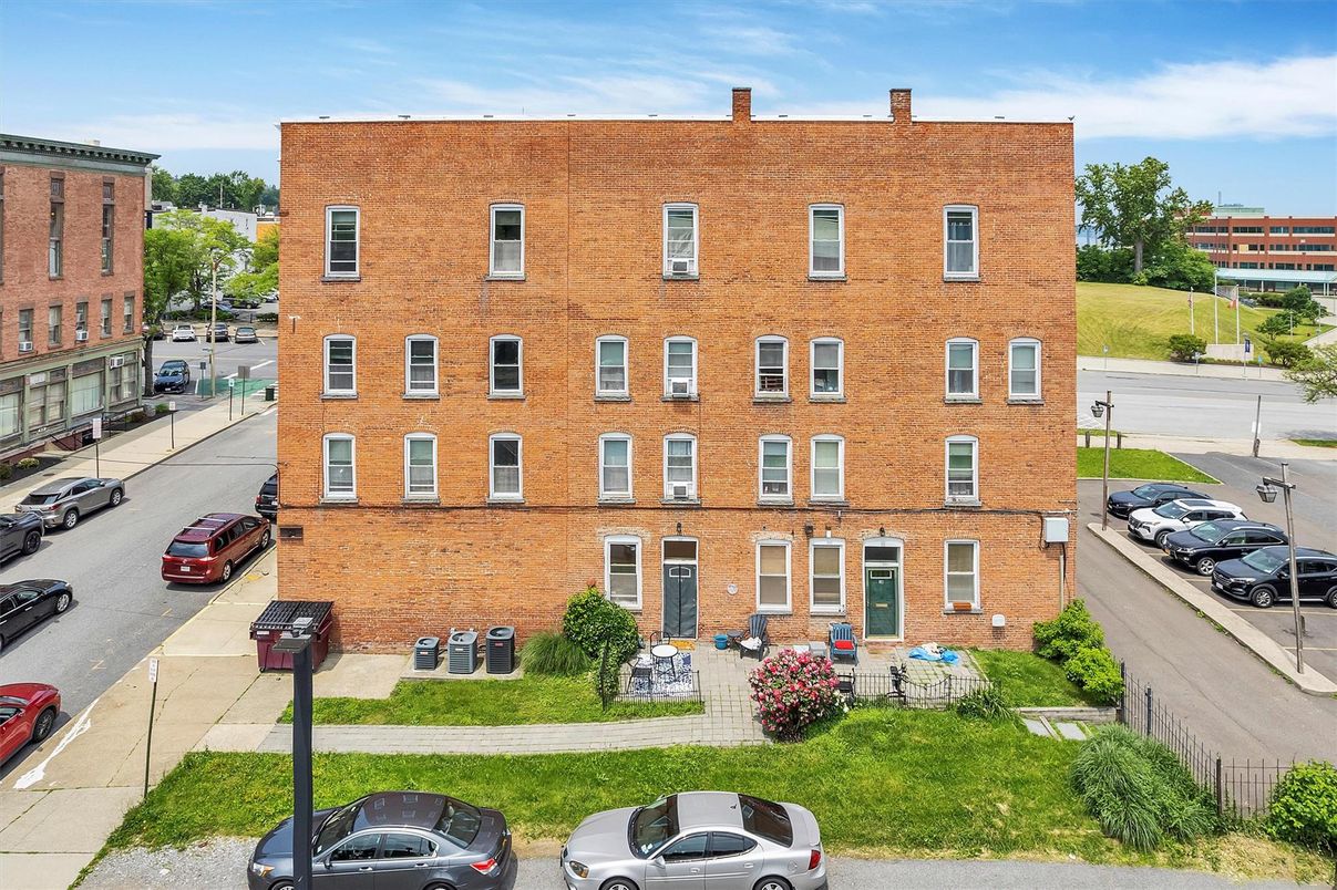 Exterior, Facade, Brick Facade, Condo Building