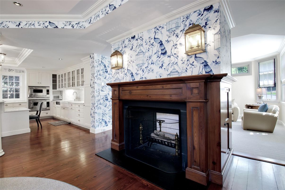 Fireplace, Interior, Kitchen, Recessed Lighting, Stainless Steel Appliances, Wood Texture Flooring
