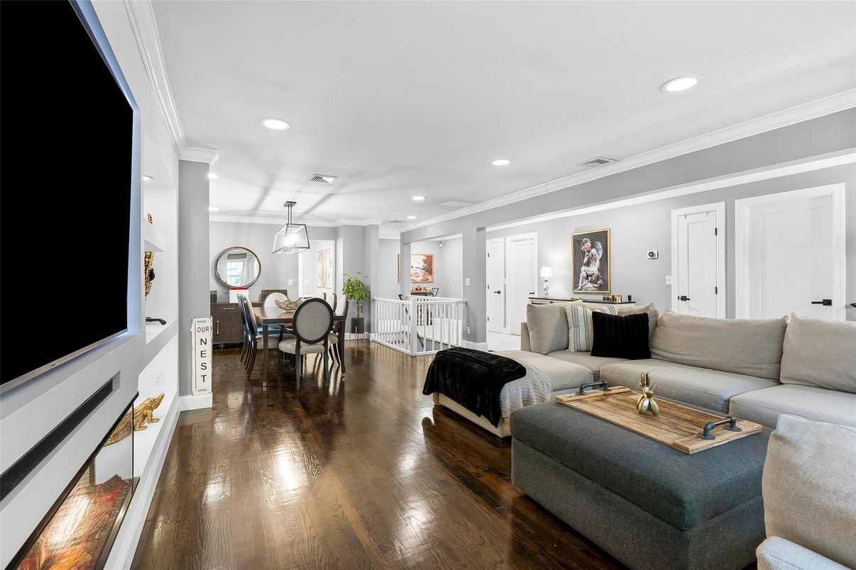 Dining room, Fireplace, Interior, Living room, Pendant Lights, Recessed Lighting, Wood Texture Flooring