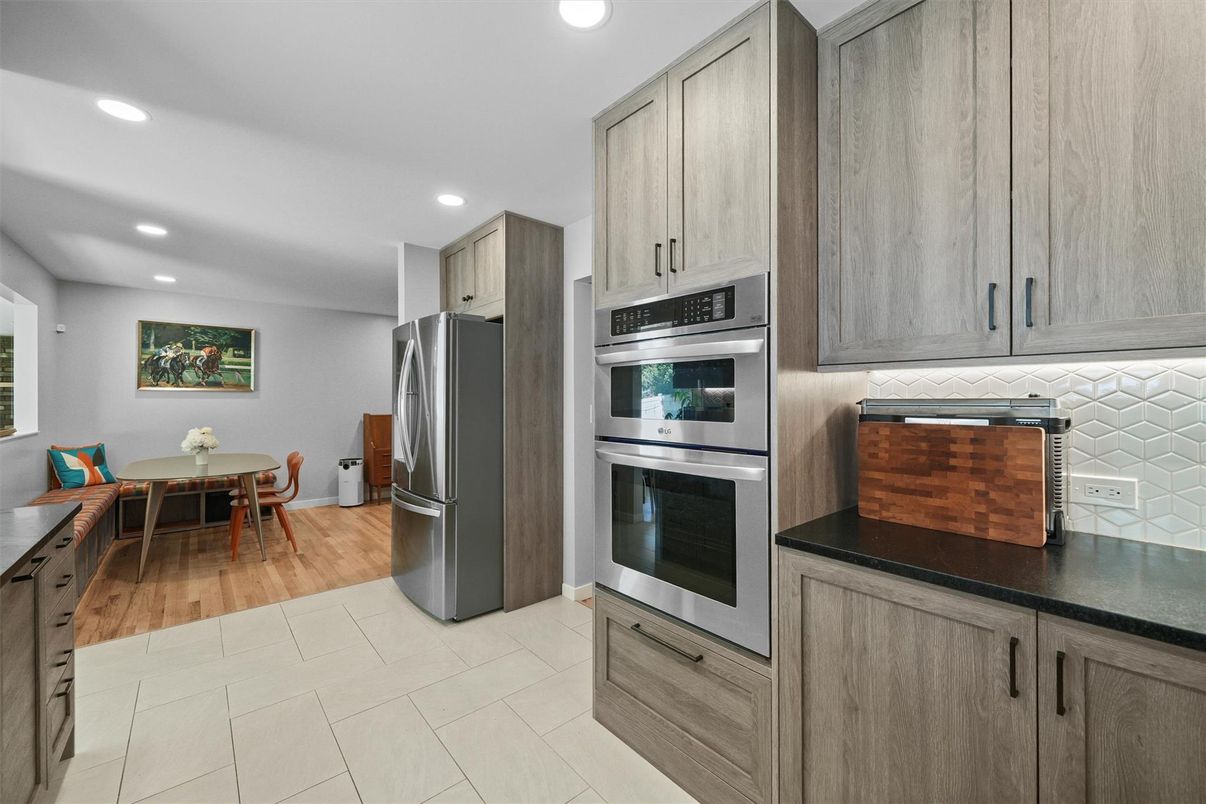 Dining room, Interior, Kitchen, Recessed Lighting, Stainless Steel Appliances, Wood Texture Flooring