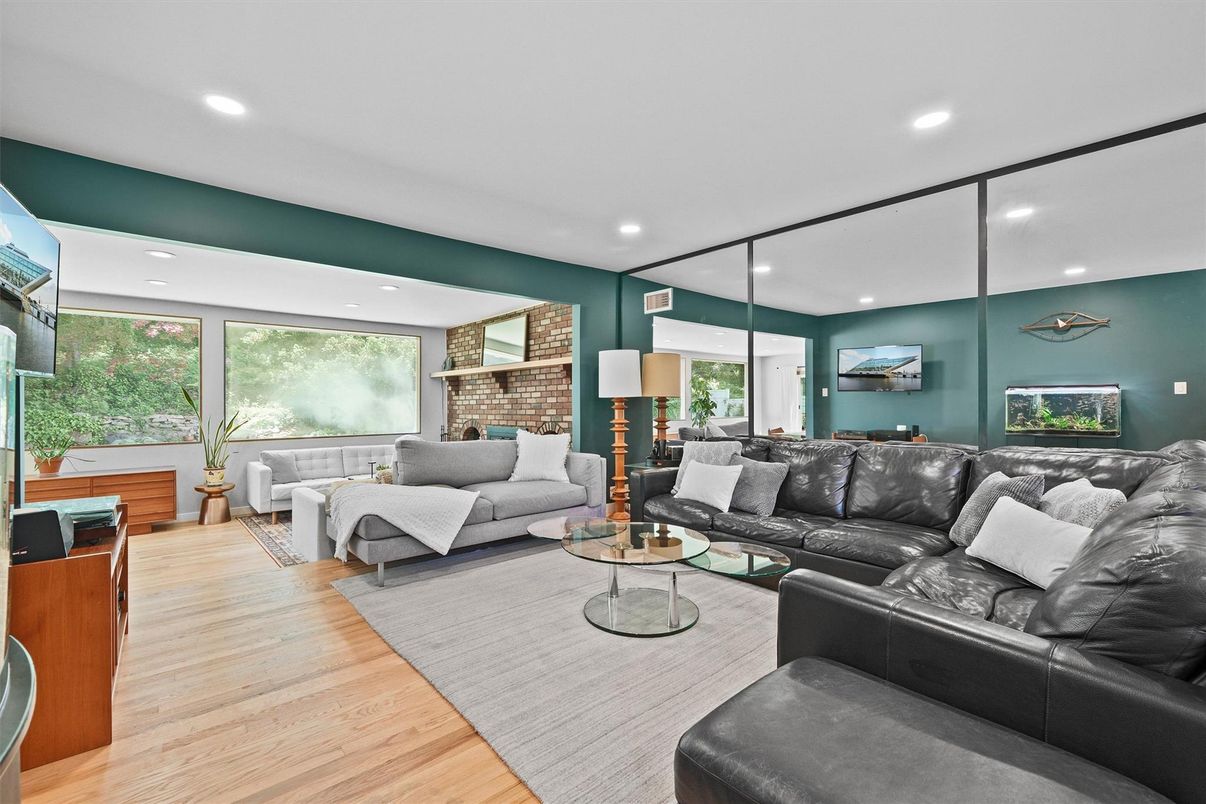 Fireplace, Interior, Living room, Recessed Lighting, Stone Walls, Wood Texture Flooring