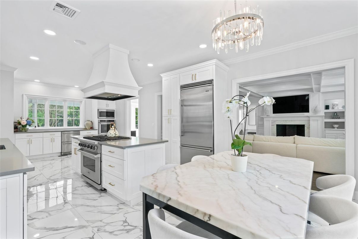 Fireplace, Interior, Kitchen, Living room, Marble, Pendant Lights, Recessed Lighting, Stainless Steel Appliances