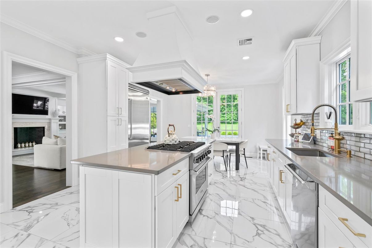Fireplace, Interior, Kitchen, Living room, Marble, Pendant Lights, Recessed Lighting, Stainless Steel Appliances