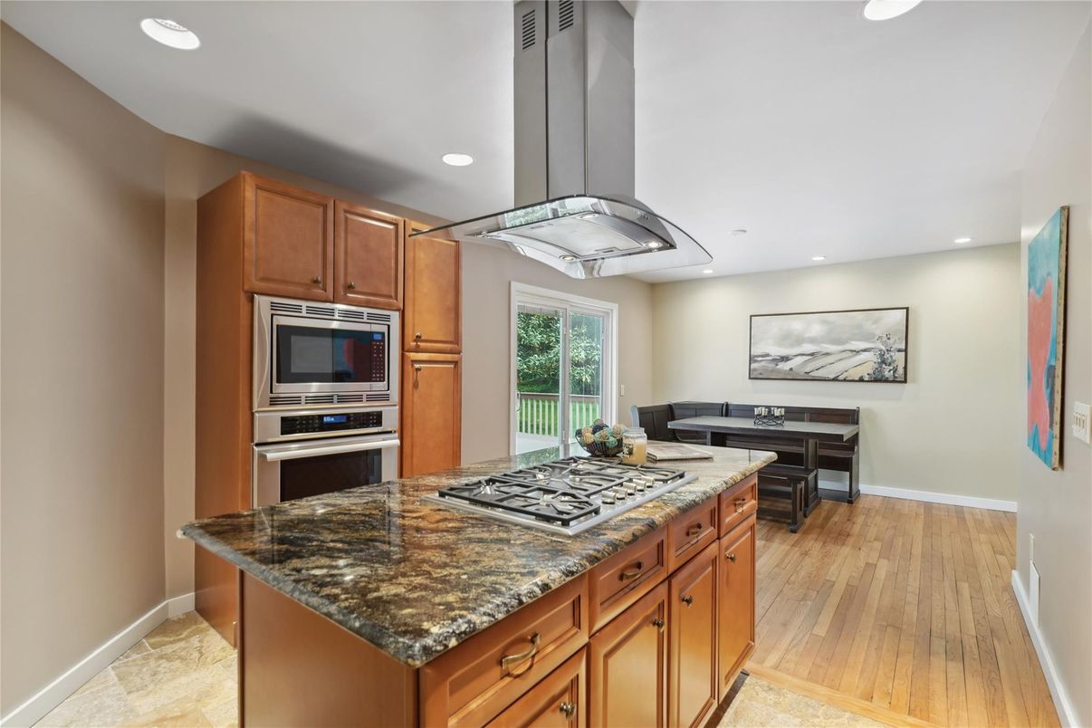 Dining room, Interior, Kitchen, Recessed Lighting, Stainless Steel Appliances, Wood Texture Flooring