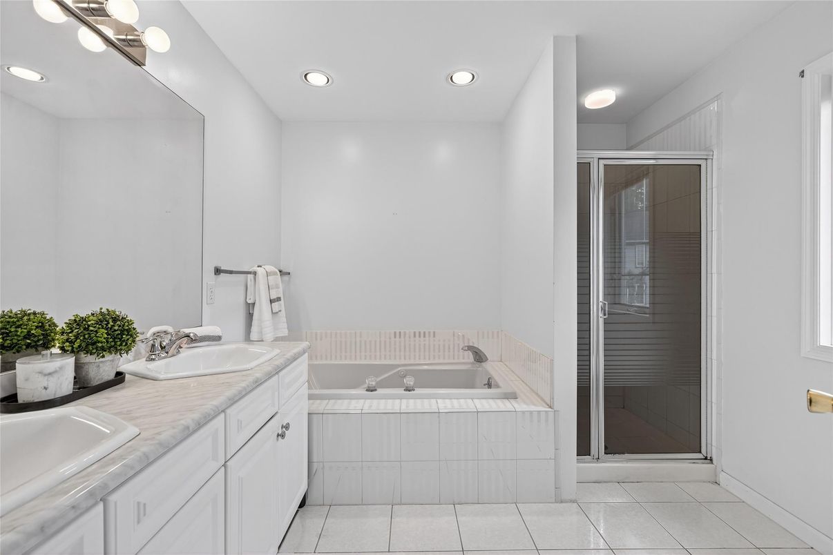 Bathroom, Dual Sink Vanities, Glass Shower, Interior, Recessed Lighting, Tile Countertops