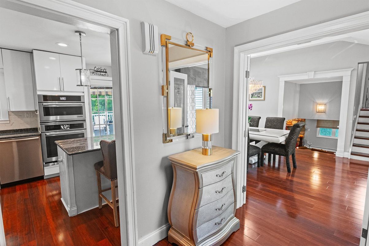 Dining room, Interior, Kitchen, Pendant Lights, Recessed Lighting, Stainless Steel Appliances, Wood Texture Flooring
