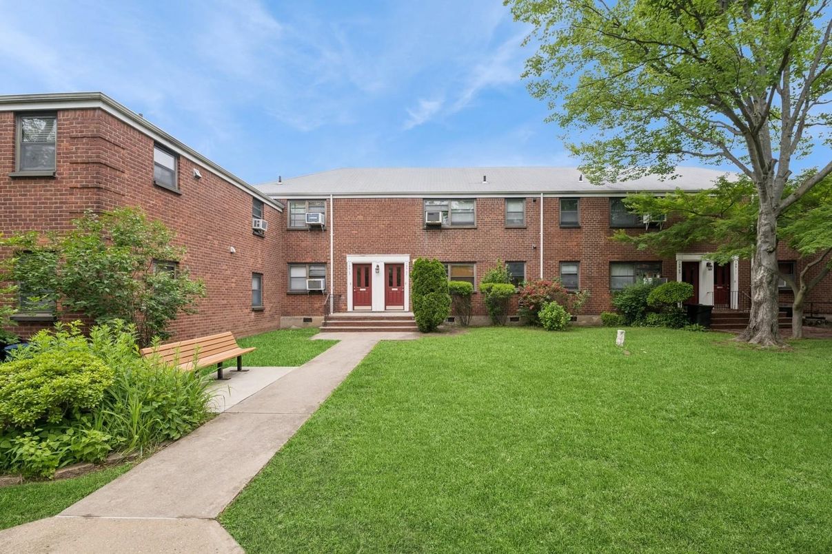 Backyard, Exterior, Facade, Brick Facade, Condo Building