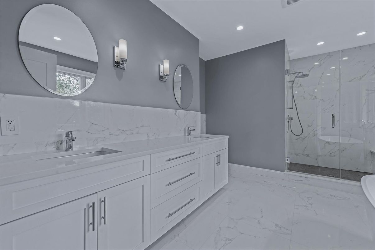 Bathroom, Dual Sink Vanities, Glass Shower, Interior, Marble, Marble Walls, Recessed Lighting