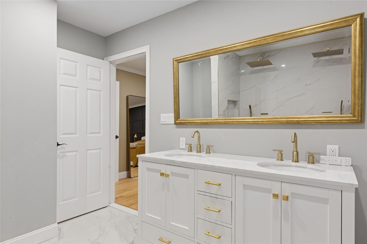 Bathroom, Dual Sink Vanities, Interior, Marble, Marble Walls, Wood Texture Flooring