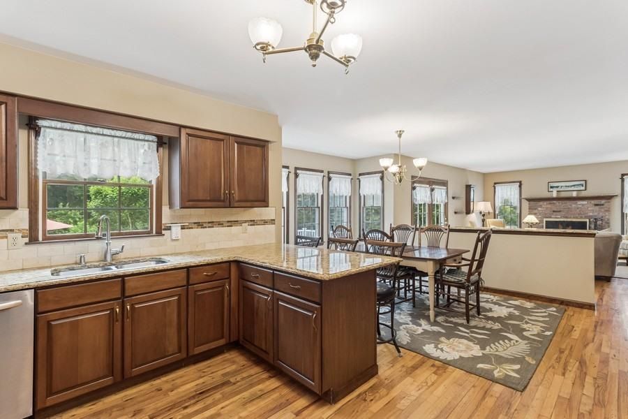 Chandelier, Dining room, Fireplace, Interior, Kitchen, Wood Texture Flooring