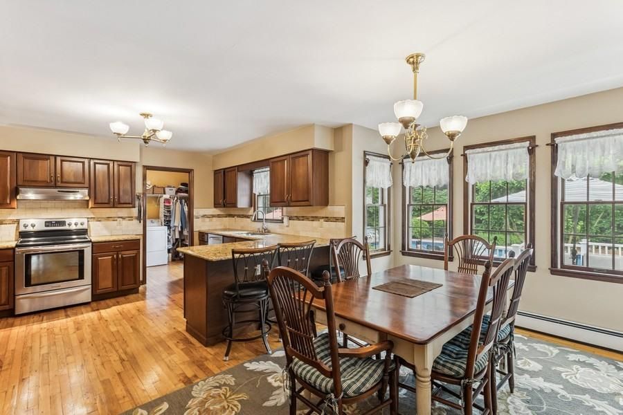 Chandelier, Dining room, Interior, Kitchen, Stainless Steel Appliances, Wood Texture Flooring