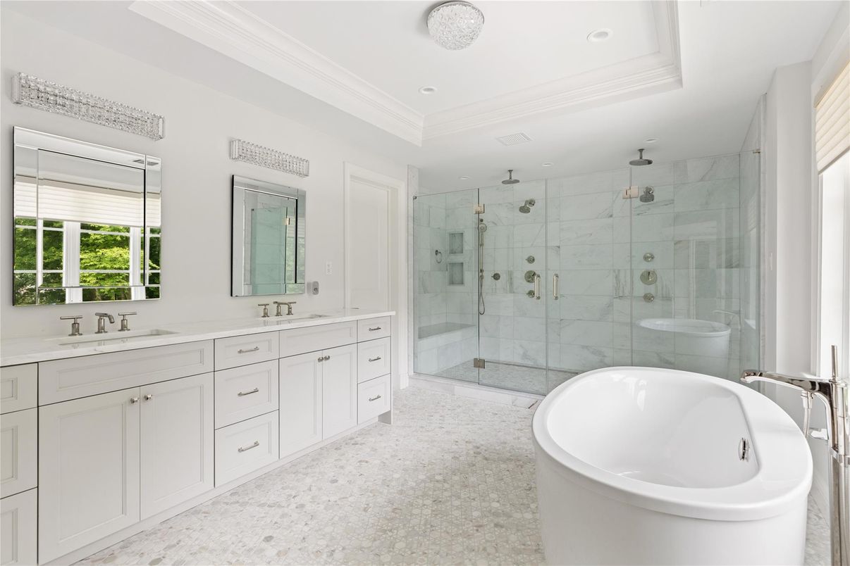 Bathroom, Dual Sink Vanities, Free Standing Baths, Glass Shower, Interior, Marble Walls, Recessed Lighting