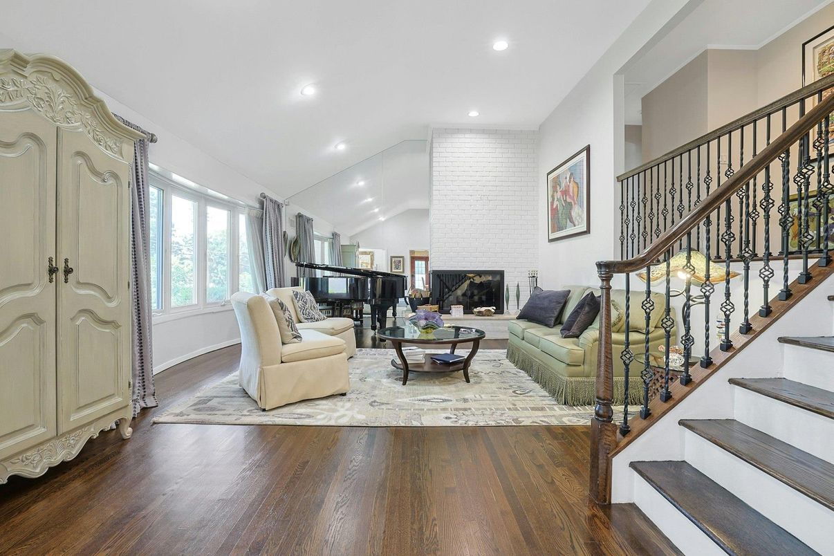 Fireplace, Interior, Living room, Piano, Recessed Lighting, Wood Texture Flooring