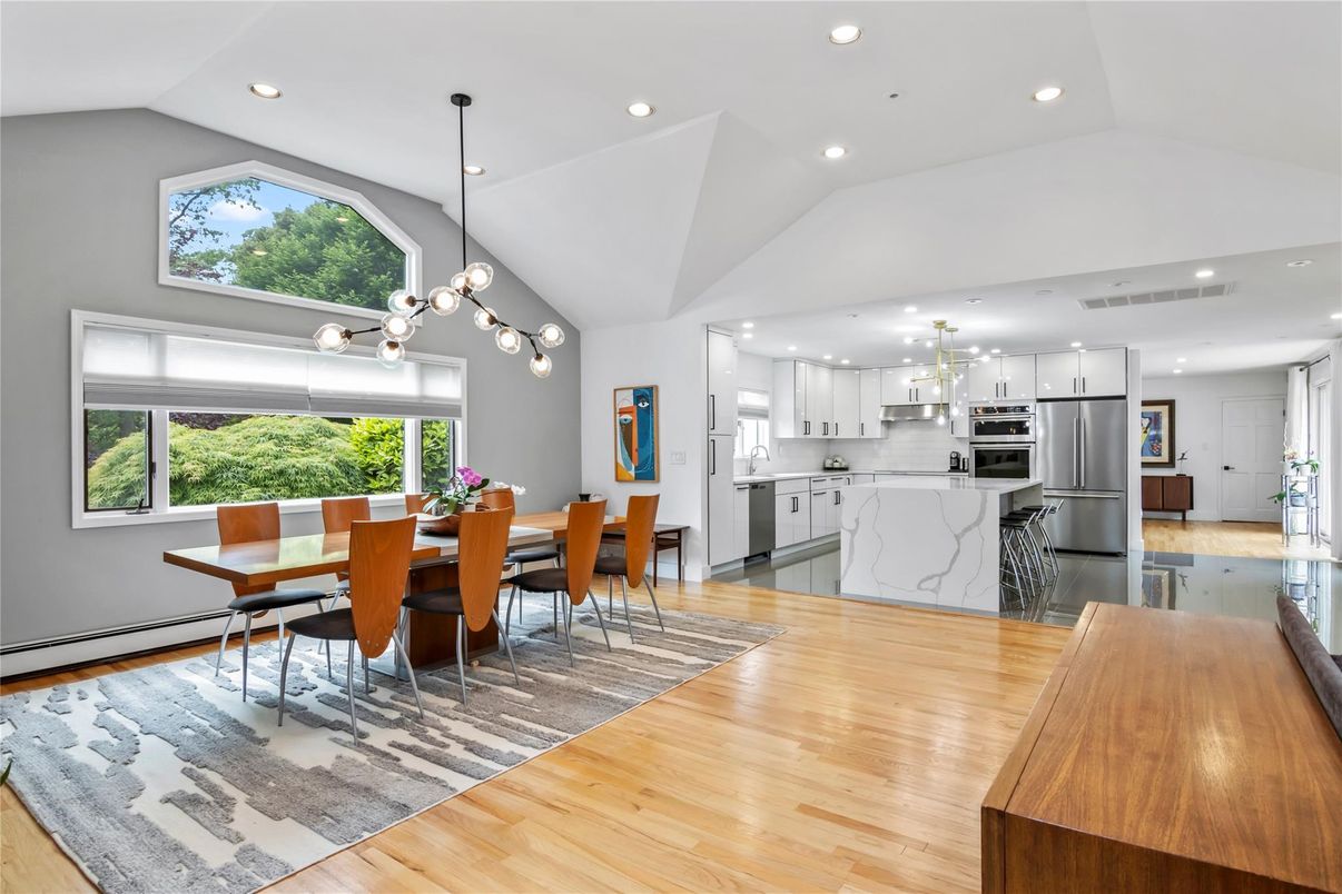 Dining room, Interior, Kitchen, Pendant Lights, Recessed Lighting, Stainless Steel Appliances, Wood Texture Flooring