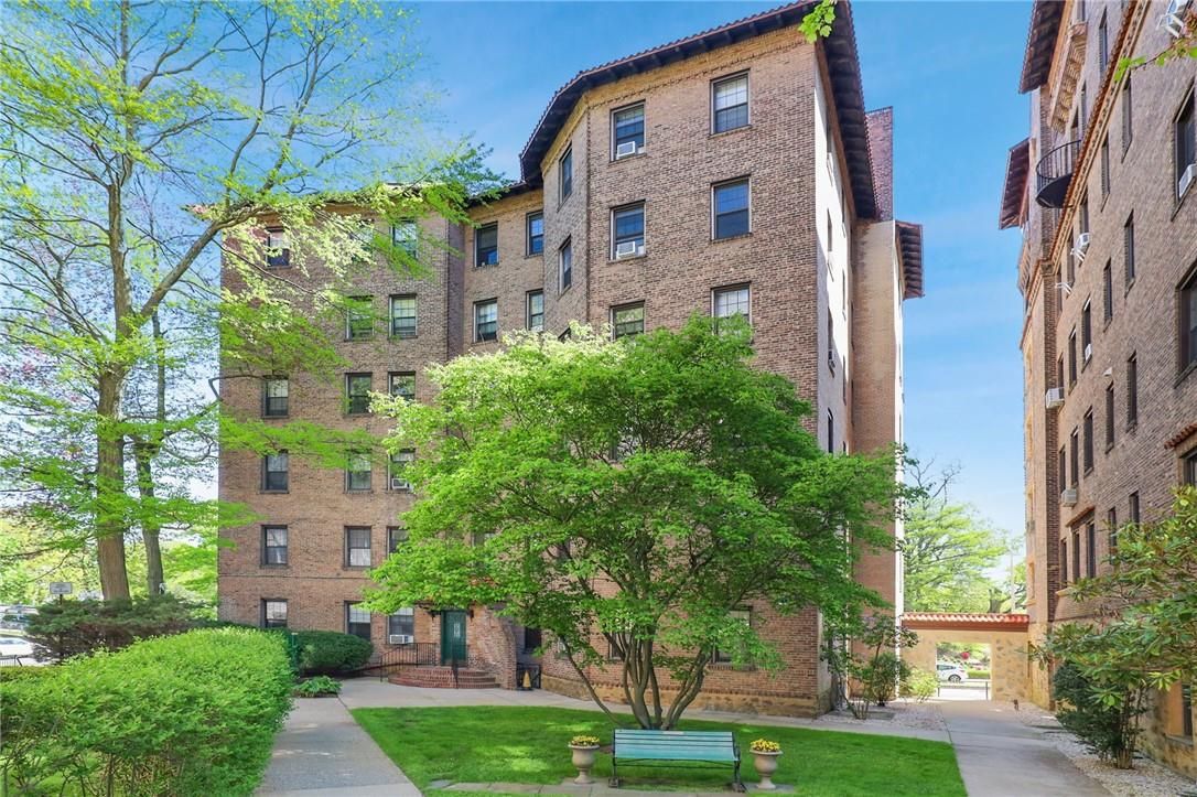 Exterior, Facade, Brick Facade, Condo Building