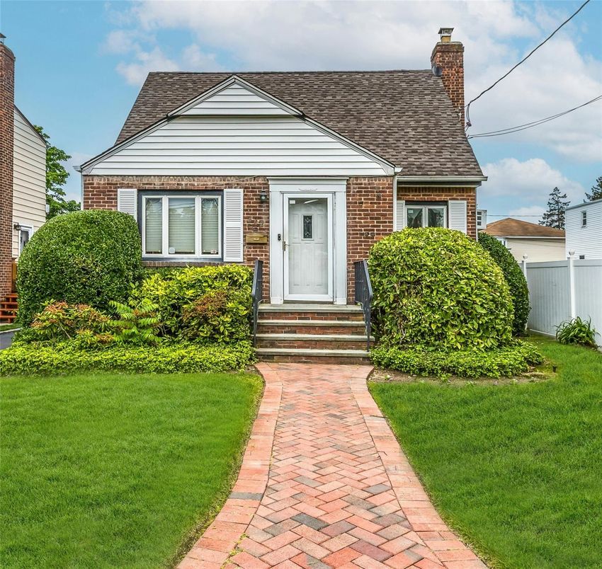 Exterior, Facade, Brick Facade, Cape Cod