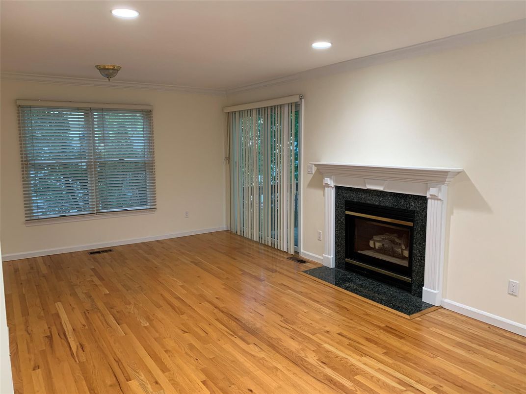 Empty room, Fireplace, Interior, Recessed Lighting, Wood Texture Flooring