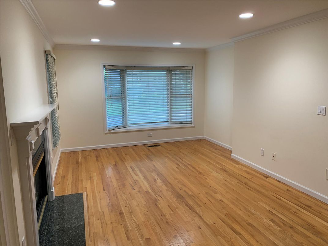 Empty room, Fireplace, Interior, Recessed Lighting, Wood Texture Flooring