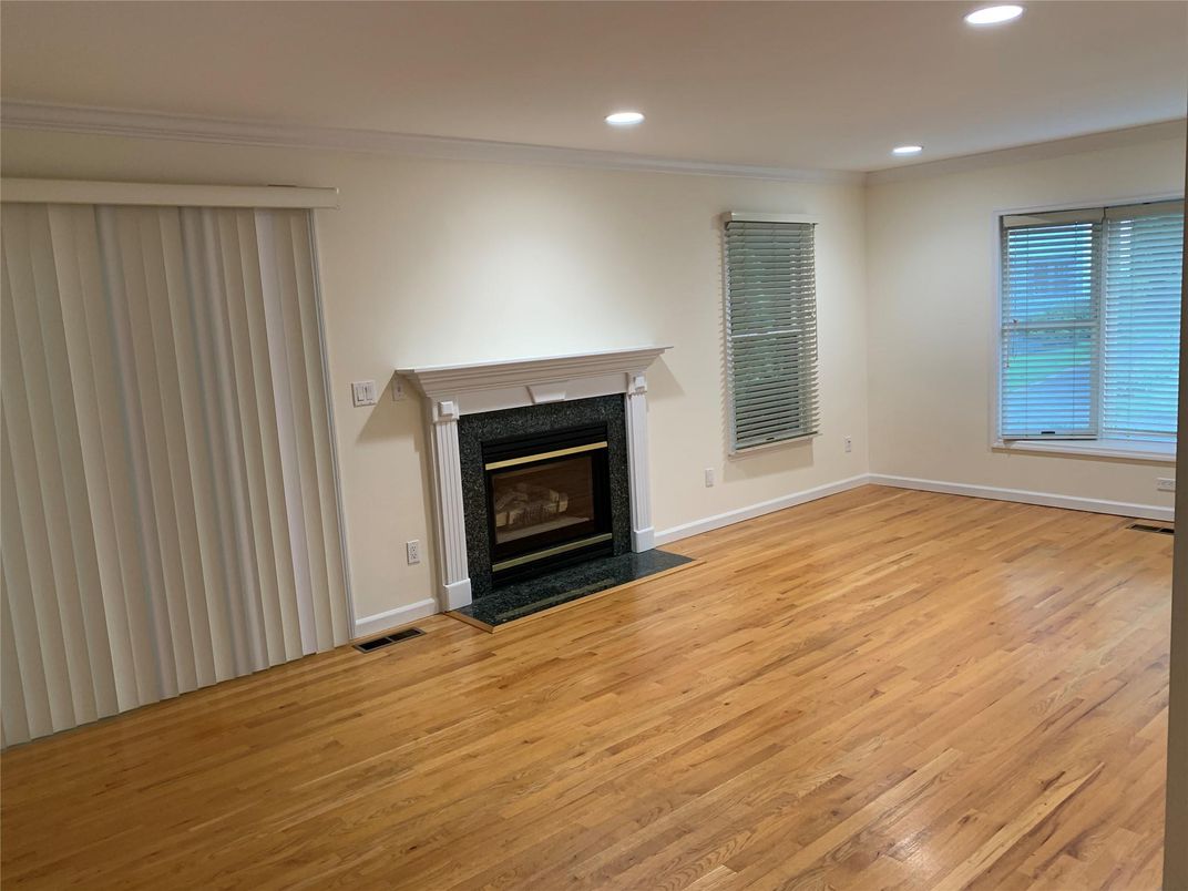 Empty room, Fireplace, Interior, Recessed Lighting, Wood Texture Flooring