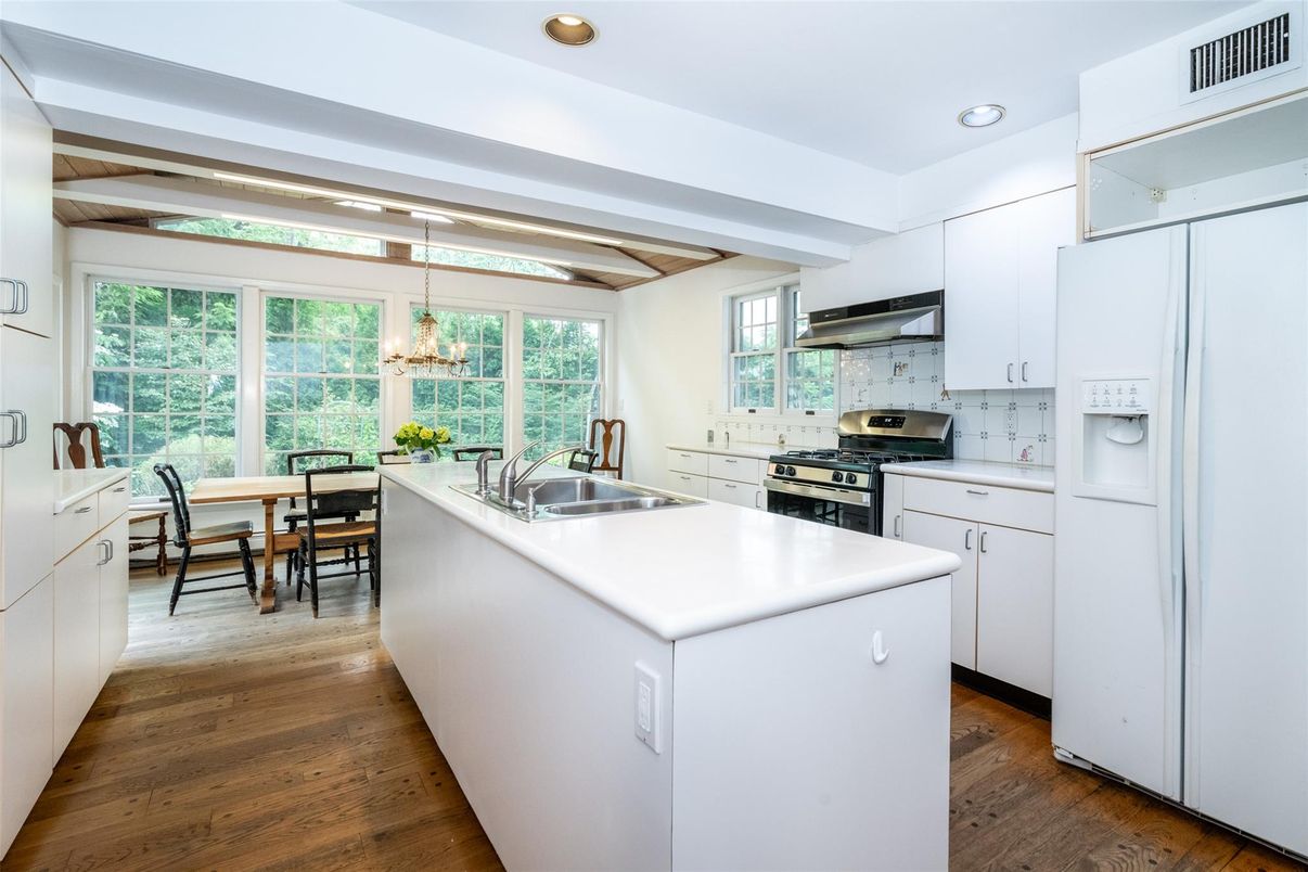 Dining room, Interior, Kitchen, Pendant Lights, Recessed Lighting, Stainless Steel Appliances, Wooden Beams, Wood Texture Flooring