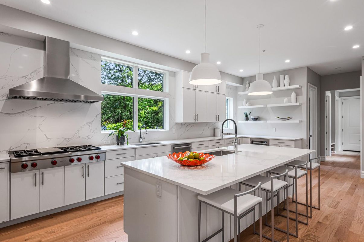 Interior, Kitchen, Marble Walls, Pendant Lights, Recessed Lighting, Stainless Steel Appliances, Wood Texture Flooring