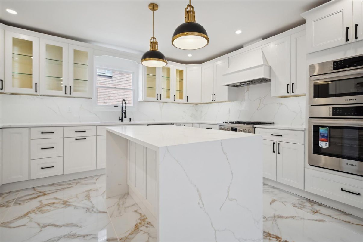 Interior, Kitchen, Marble, Marble Walls, Pendant Lights, Recessed Lighting, Stainless Steel Appliances