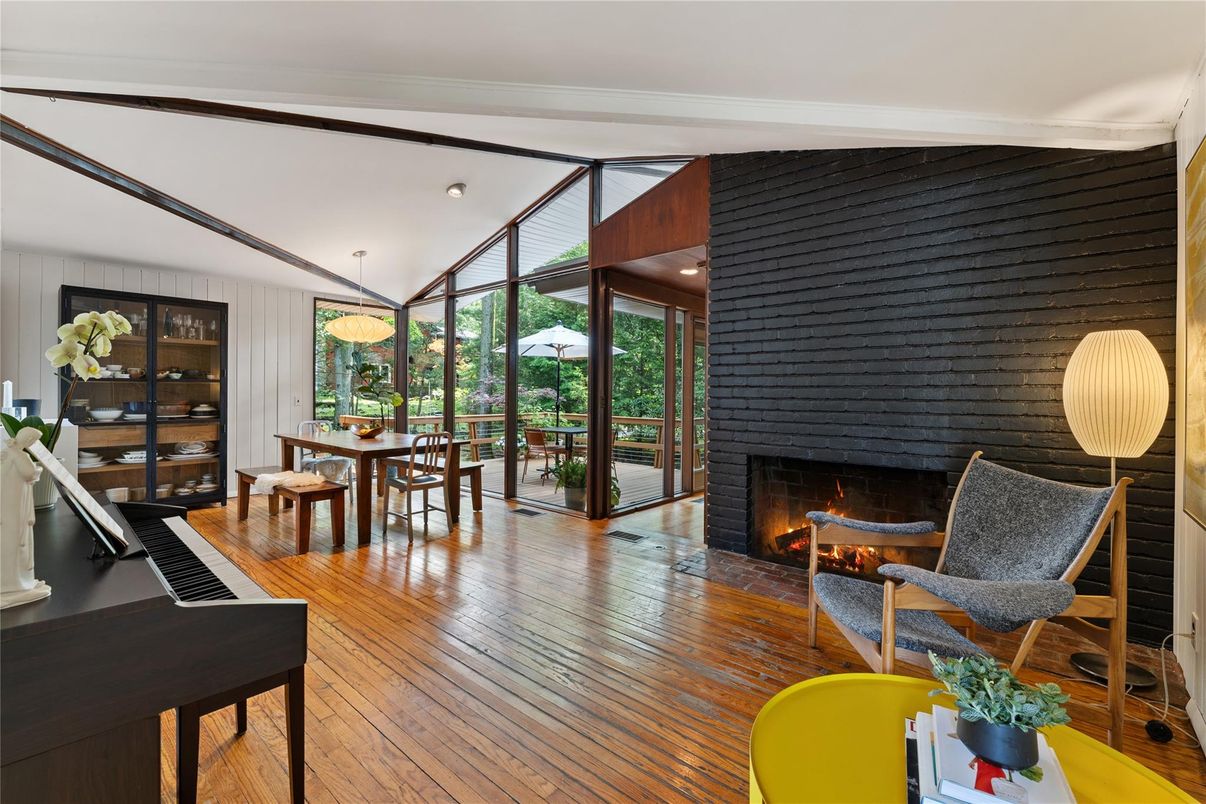 Dining room, Fireplace, Interior, Pendant Lights, Piano, Wood Texture Flooring