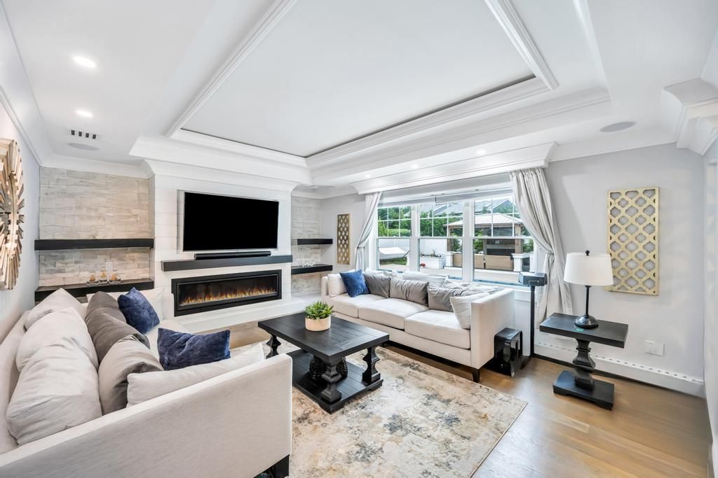 Fireplace, Interior, Living room, Recessed Lighting, Stone Walls, Wood Texture Flooring
