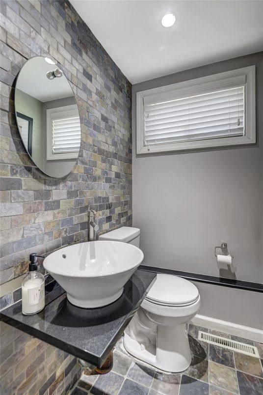 Bathroom, Free Standing Baths, Interior, Recessed Lighting, Stone Walls