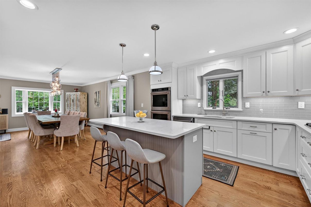 Chandelier, Dining room, Interior, Kitchen, Pendant Lights, Recessed Lighting, Stainless Steel Appliances, Wood Texture Flooring