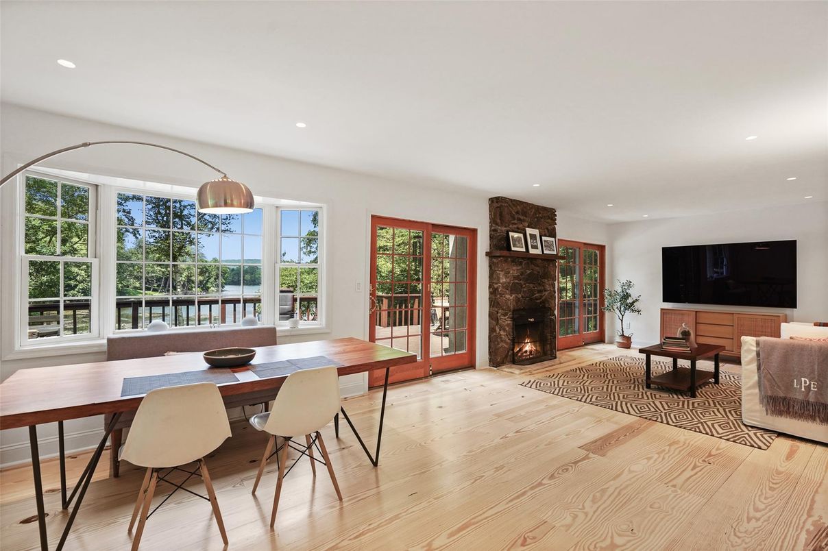 Dining room, Fireplace, Interior, Living room, Recessed Lighting, Wood Texture Flooring