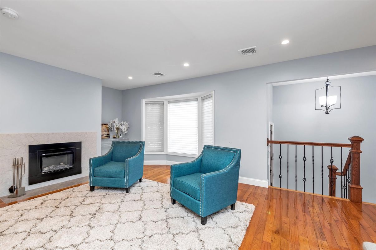 Fireplace, Interior, Pendant Lights, Recessed Lighting, Wood Texture Flooring