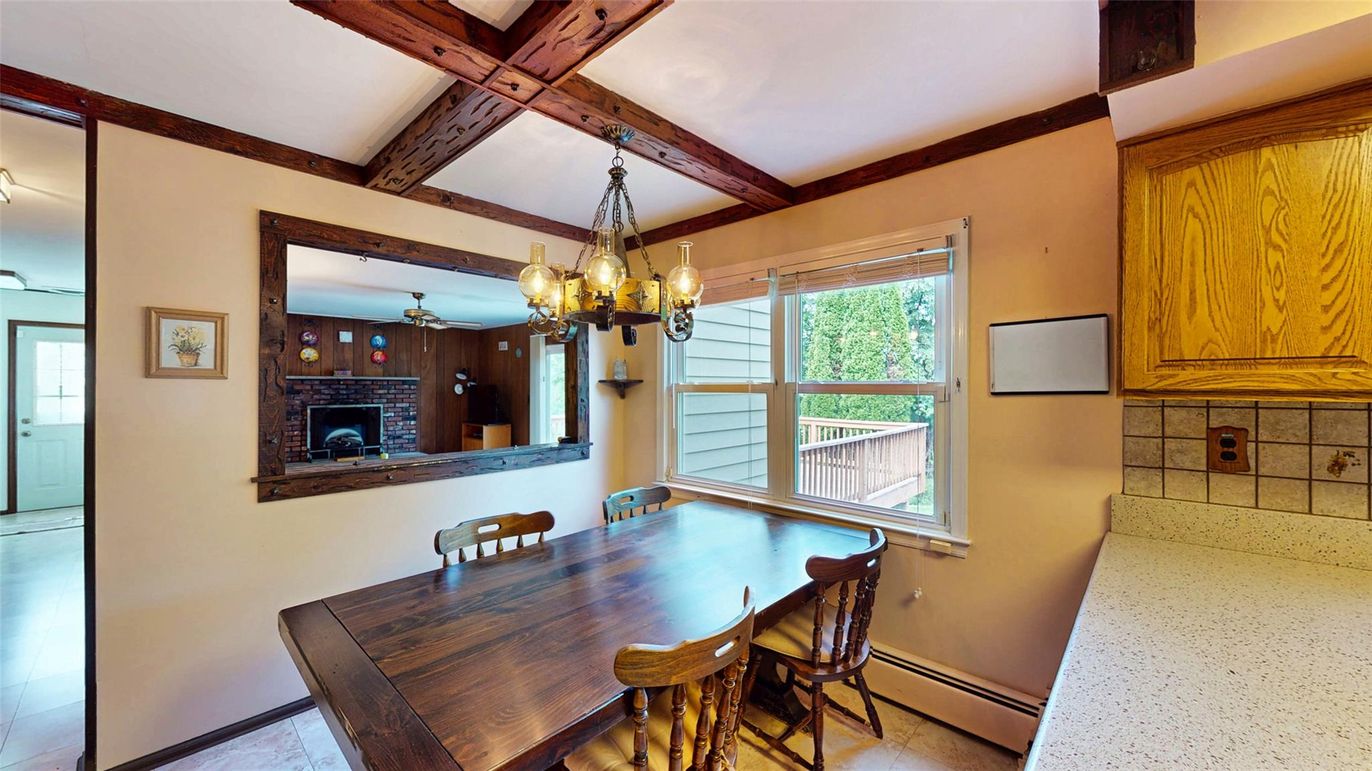Chandelier, Dining room, Fireplace, Interior, Wooden Beams