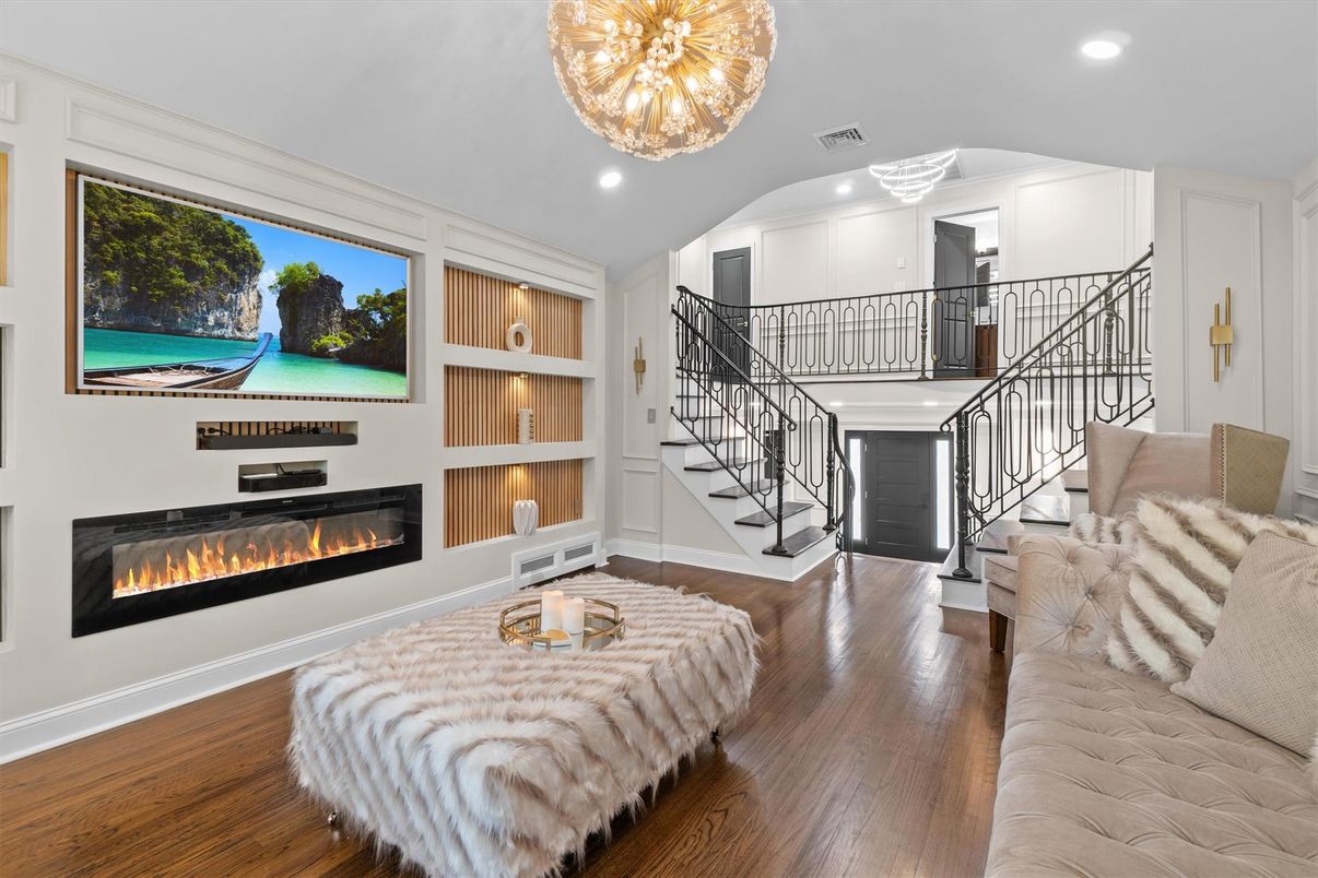 Chandelier, Fireplace, Interior, Living room, Recessed Lighting, Wood Texture Flooring