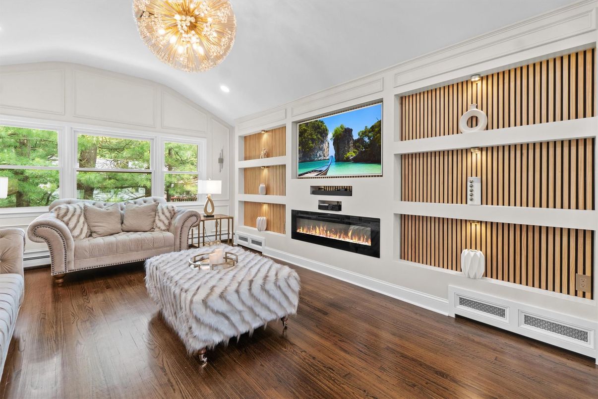 Chandelier, Fireplace, Interior, Living room, Recessed Lighting, Wood Texture Flooring