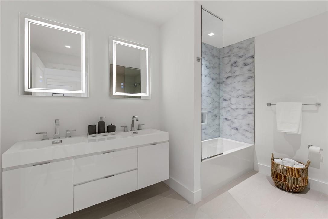 Bathroom, Dual Sink Vanities, Glass Shower, Interior, Marble Walls, Recessed Lighting