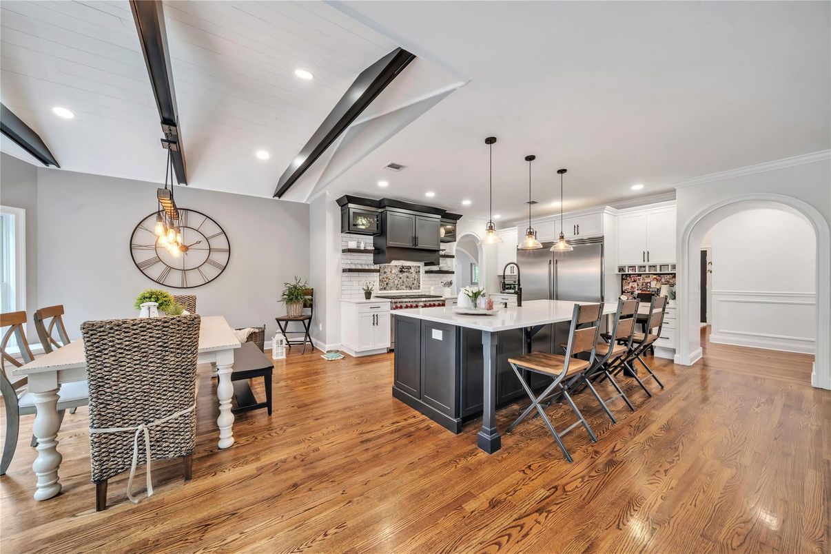 Dining room, Interior, Kitchen, Pendant Lights, Recessed Lighting, Stainless Steel Appliances, Wood Texture Flooring