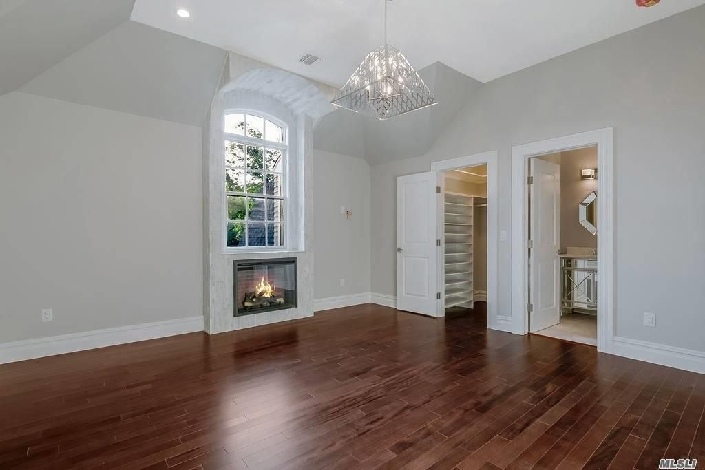 Empty room, Fireplace, Interior, Pendant Lights, Recessed Lighting, Wood Texture Flooring