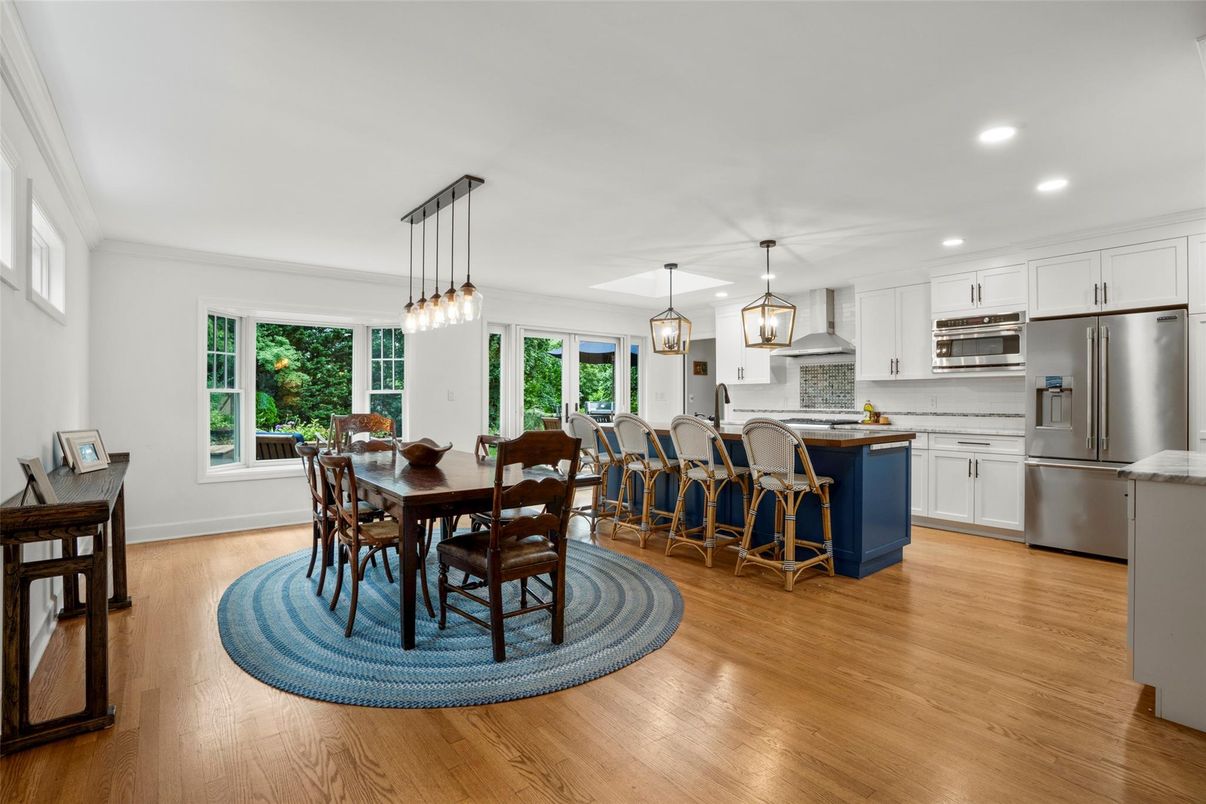 Dining room, Interior, Kitchen, Pendant Lights, Recessed Lighting, Stainless Steel Appliances, Wood Texture Flooring