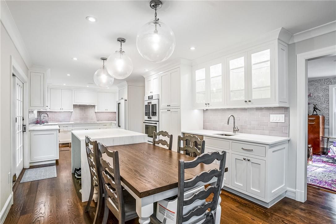 Dining room, Interior, Kitchen, Pendant Lights, Recessed Lighting, Stainless Steel Appliances, Wood Texture Flooring