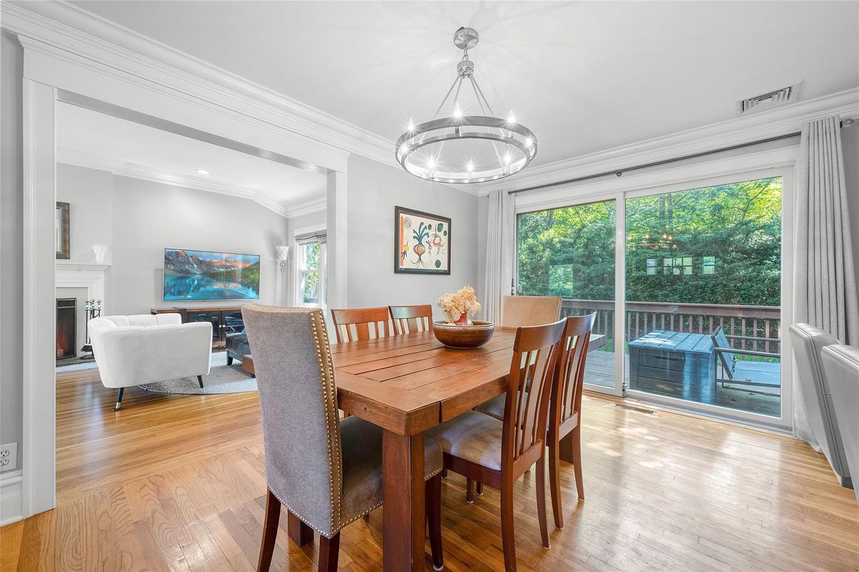 Dining room, Fireplace, Interior, Living room, Pendant Lights, Recessed Lighting, Wood Texture Flooring