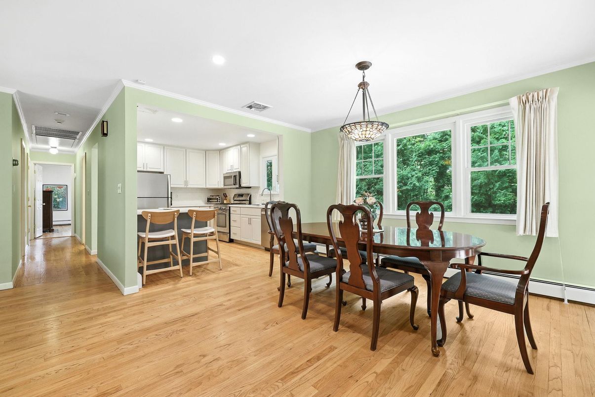 Chandelier, Dining room, Interior, Kitchen, Pendant Lights, Recessed Lighting, Stainless Steel Appliances, Wood Texture Flooring