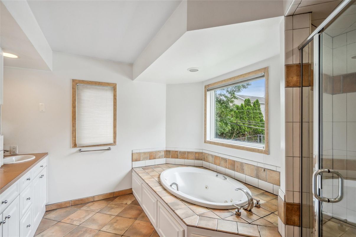 Bathroom, Dual Sink Vanities, Glass Shower, Interior, Recessed Lighting, Tile Countertops