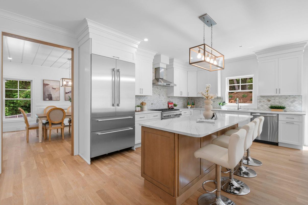 Dining room, Interior, Kitchen, Pendant Lights, Recessed Lighting, Stainless Steel Appliances, Wood Texture Flooring